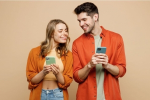 couple talking with phones couple talking with phones